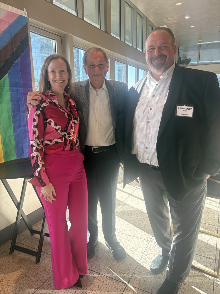 Kathy Gordon, Jim Catanzaro, and a Client Partner at the reception in Seattle. 